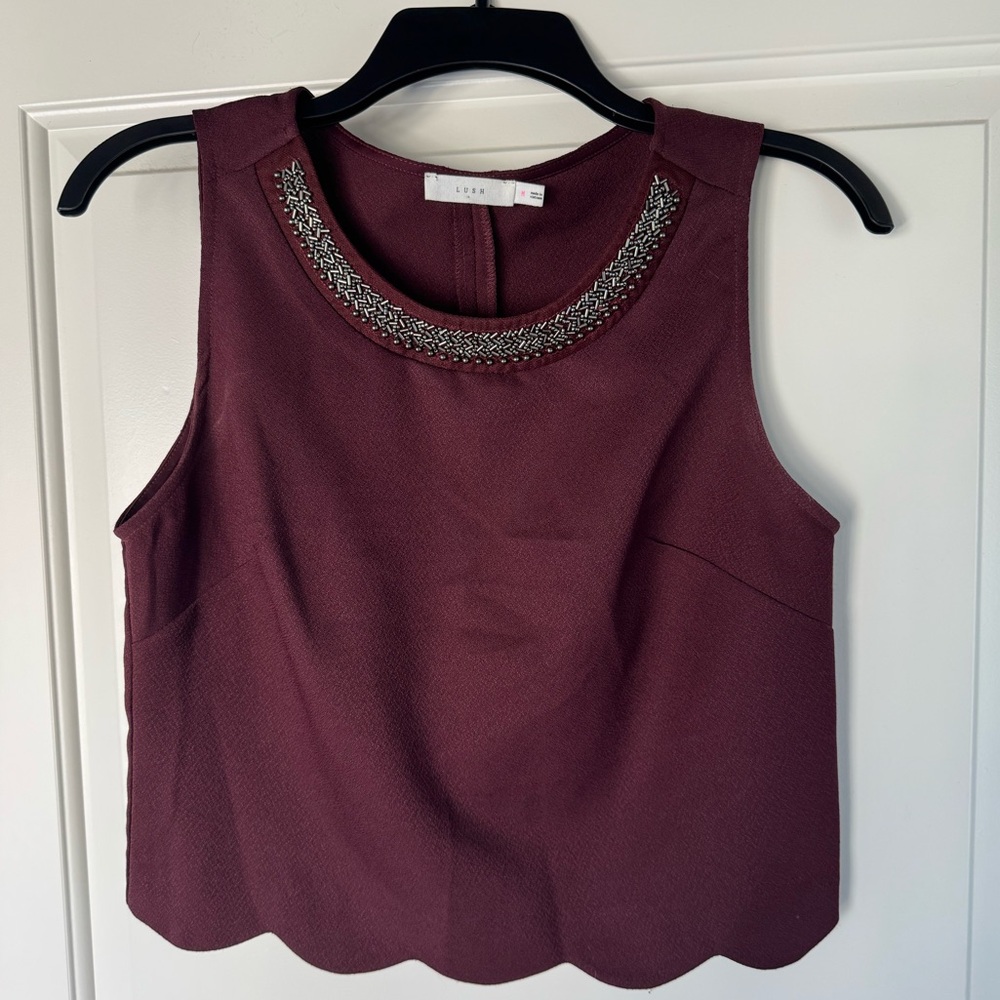Lush Maroon Sleeveless Blouse with Embellished Neckline